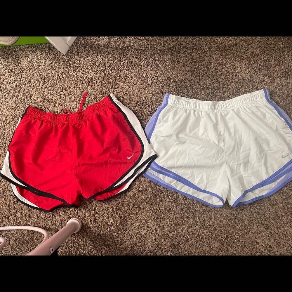 2 pairs of Nike running shorts